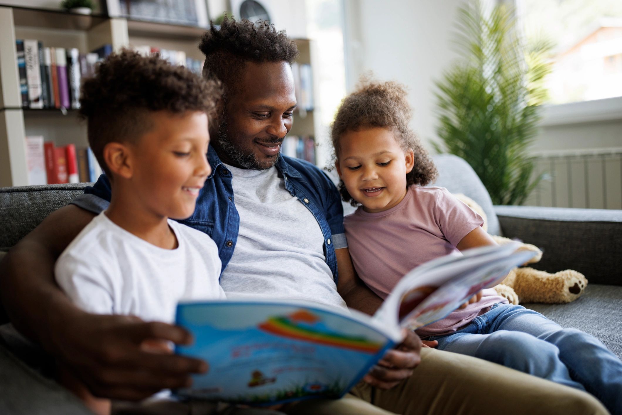 African American family reading together